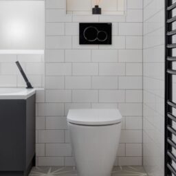 1-Delicate-Metro-forever-white-gloss-bathroom-black.jpg