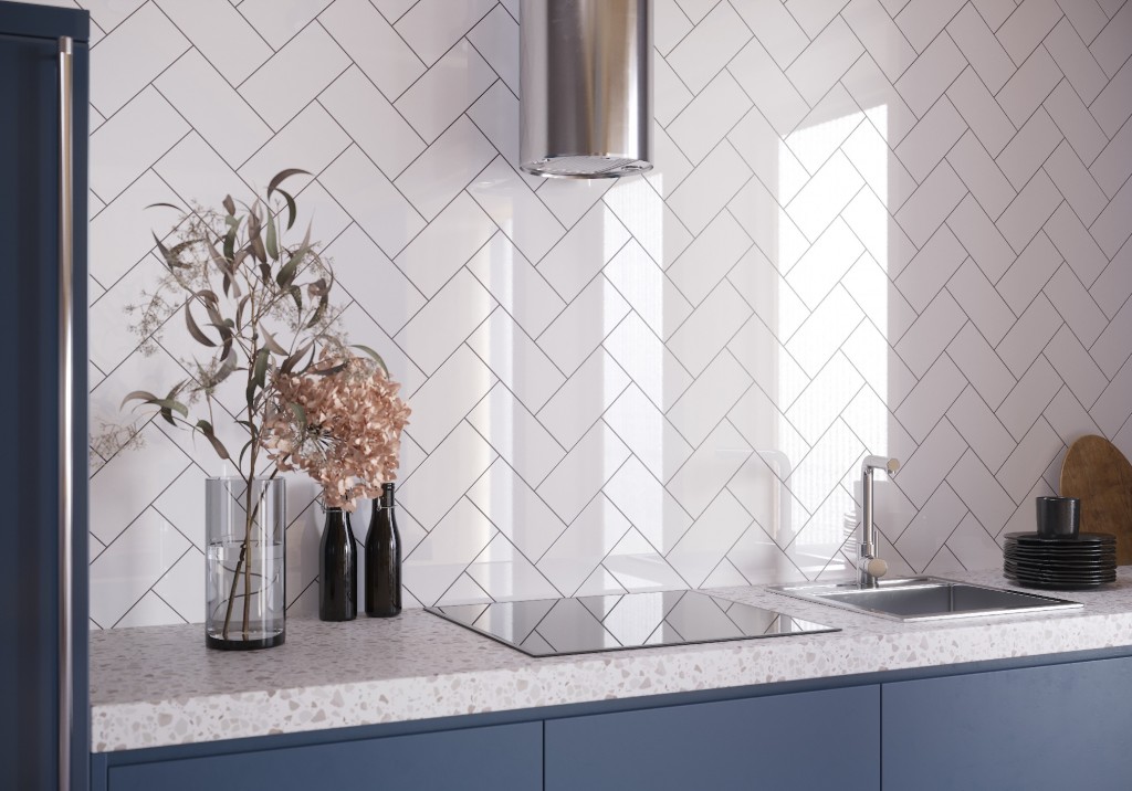 Forever White metro gloss ceramic wall tiles in herringbone for a kitchen splashback