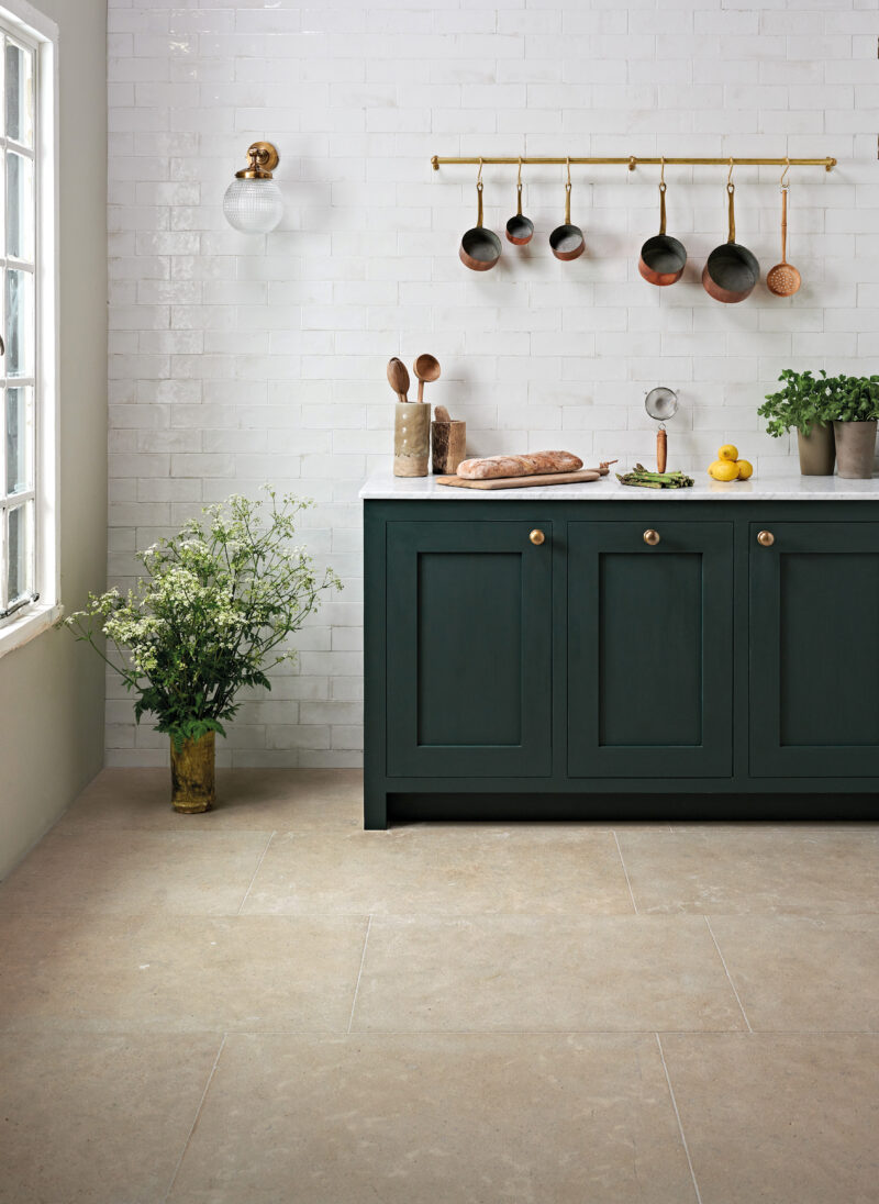 Cepes Limestone flooring in dark green kitchen