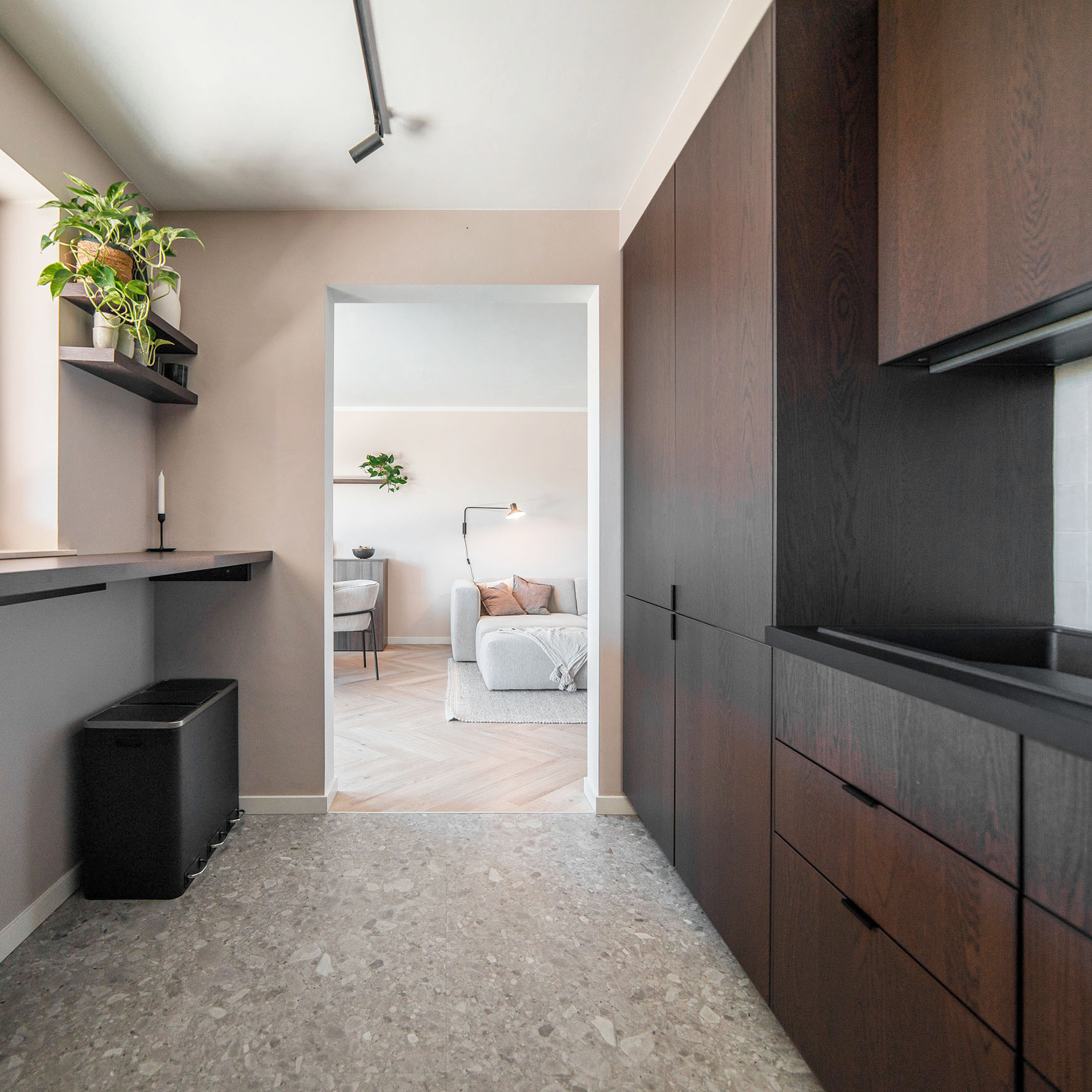 F027 Ceppo dark wood kitchen renovation with floating rigid vinyl flooring