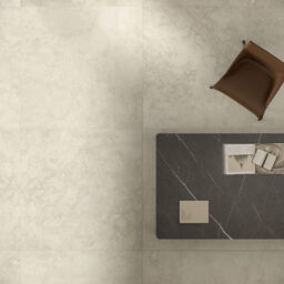Portraits Erice italian porcelain wall and floor tile in warm cream stone effect in a home office